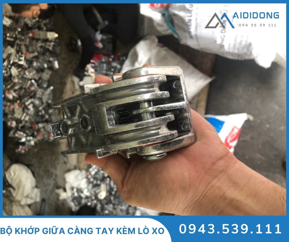 Bộ khớp giữa càng tay kèm lò xo (2)